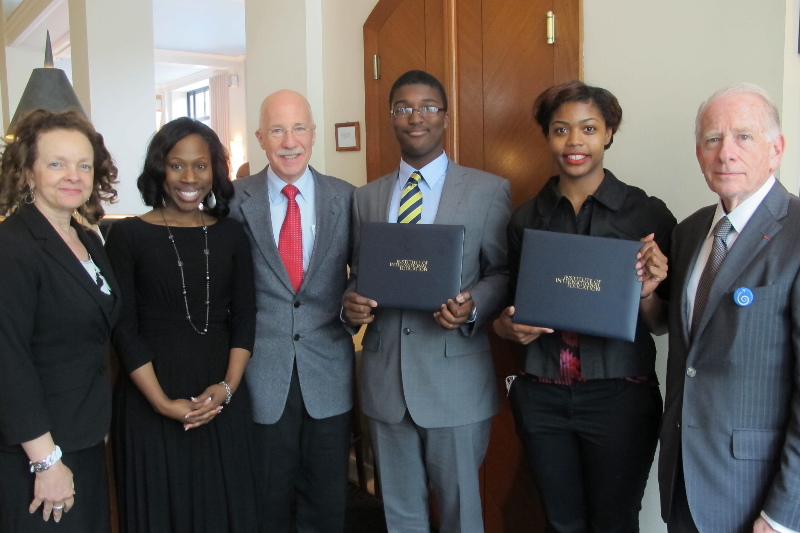 Photo: President and Board Member with young award winners