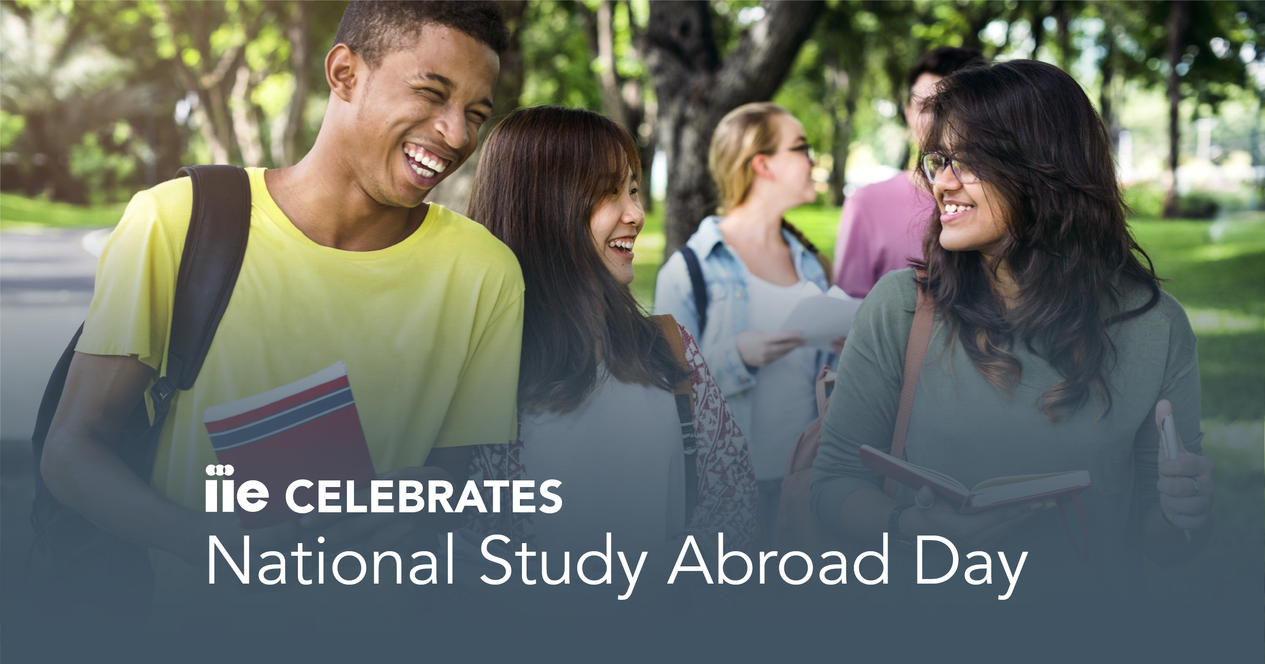 Picture of students walking and laughing with writing at bottom of photo saying "IIE Celebrates National Study Abroad Day."