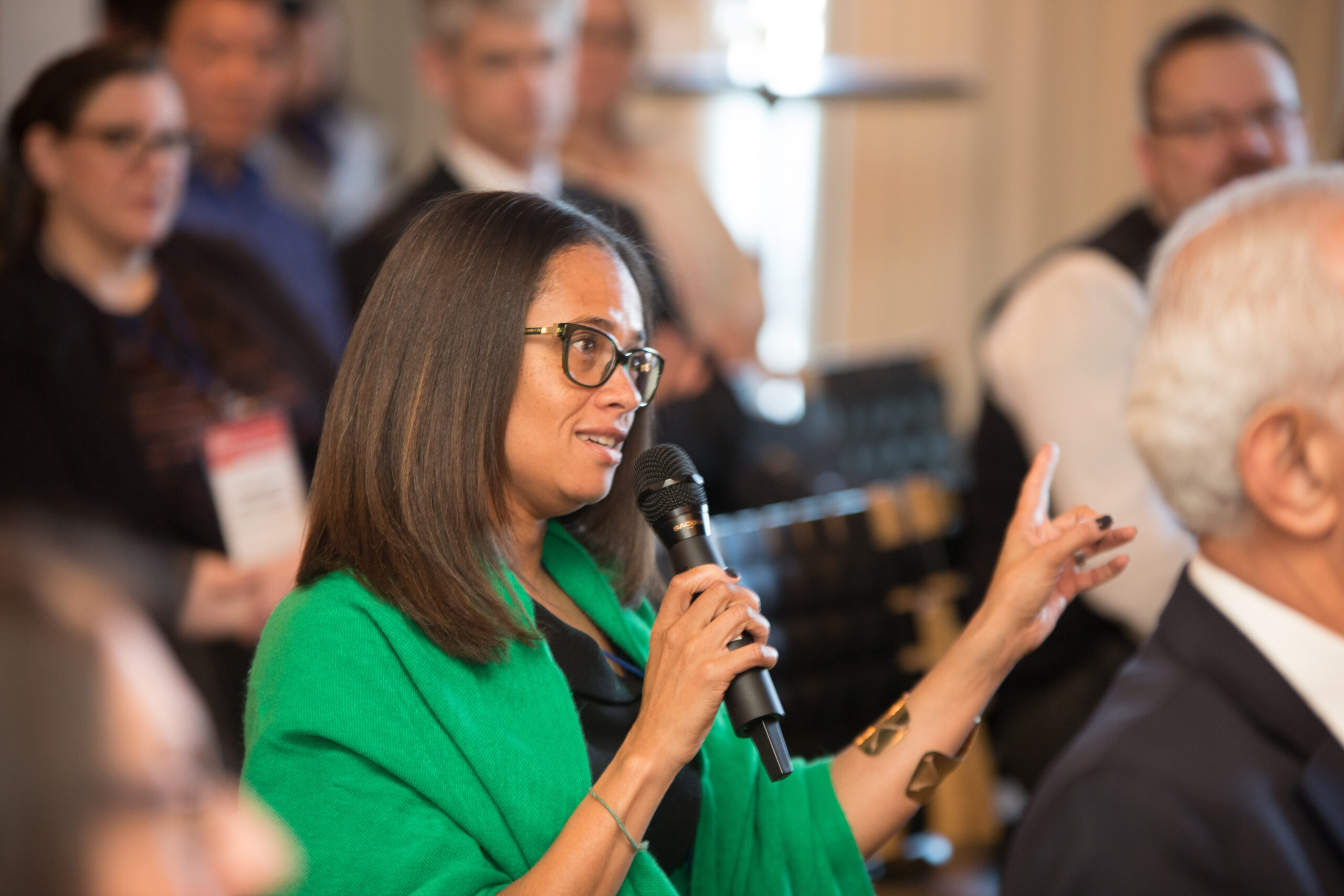 Woman speaks in crowd