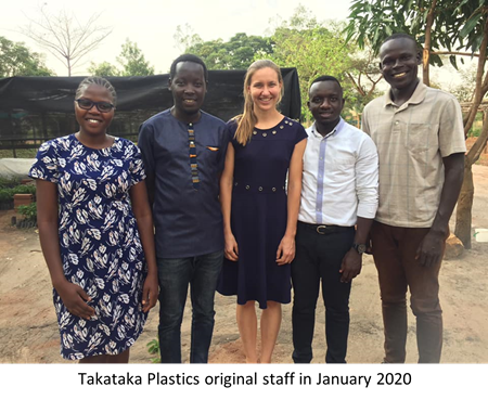 Five people stand in front of camera