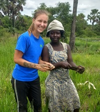 Paige and friend gutting fish