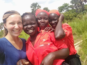 Paige and 3 women fetching water from borehole