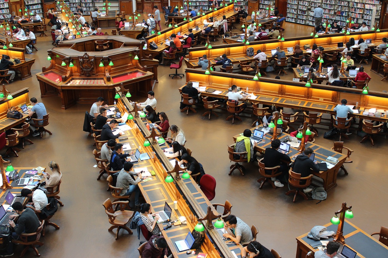 Students studying in a university library