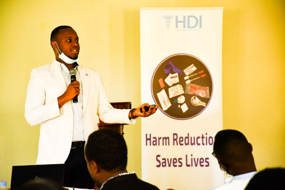 Dr. Jean Olivier Twahirwa Rwema discussing findings of a study among People who Inject Drugs in Kigali and the programmatic implications of those findings for People who Inject Drugs in Rwanda in January 2022. The event was organized in collaboration with Health Development Initiative.