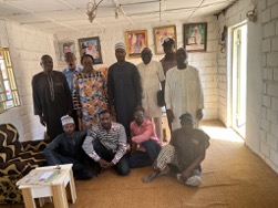 Dr. Emeka-Ogbonna with the Sarki, community leaders, IDP camp leaders, and academic colleagues.