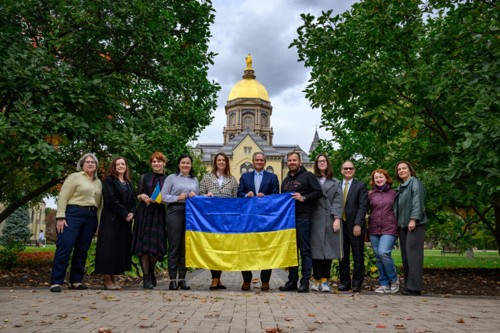 UCU delegation pictured with staff from Notre Dame International in front of the Golden Dome.