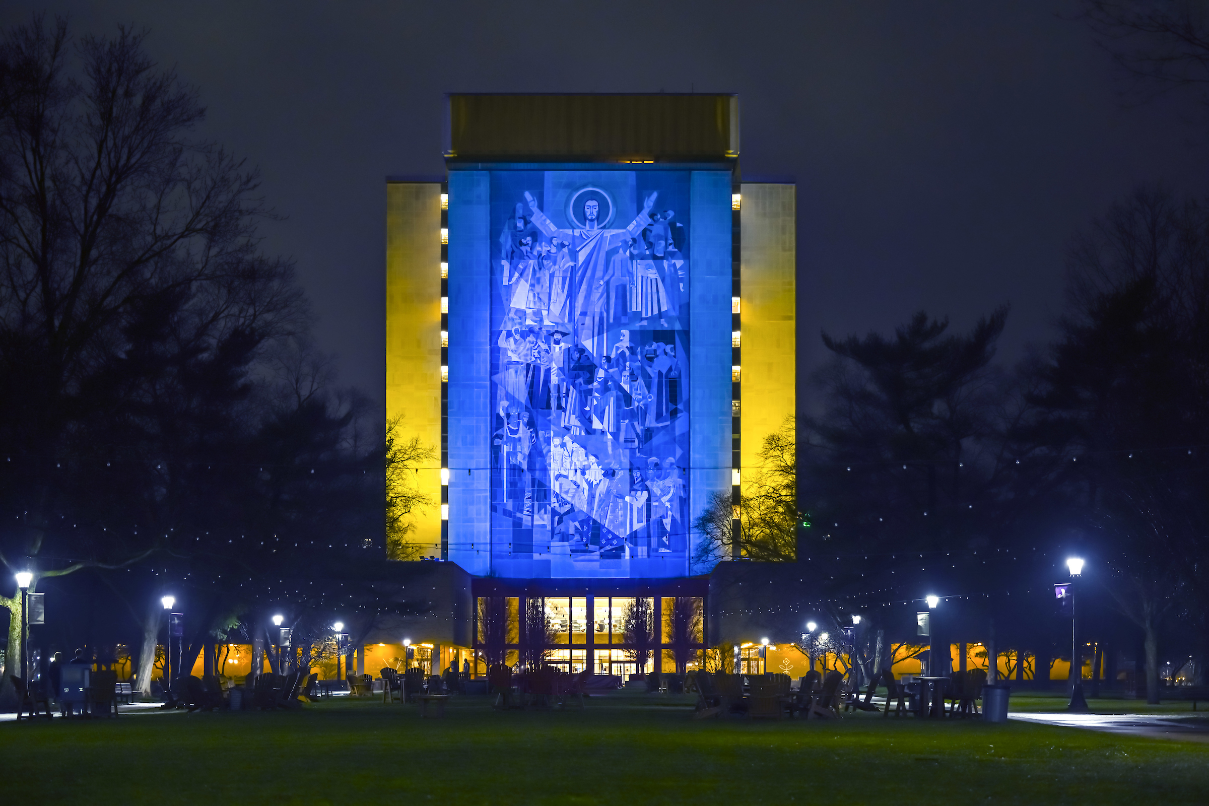 Notre Dame's Hesburgh Library Word of Life Mural is lit in the colors of the Ukrainian flag