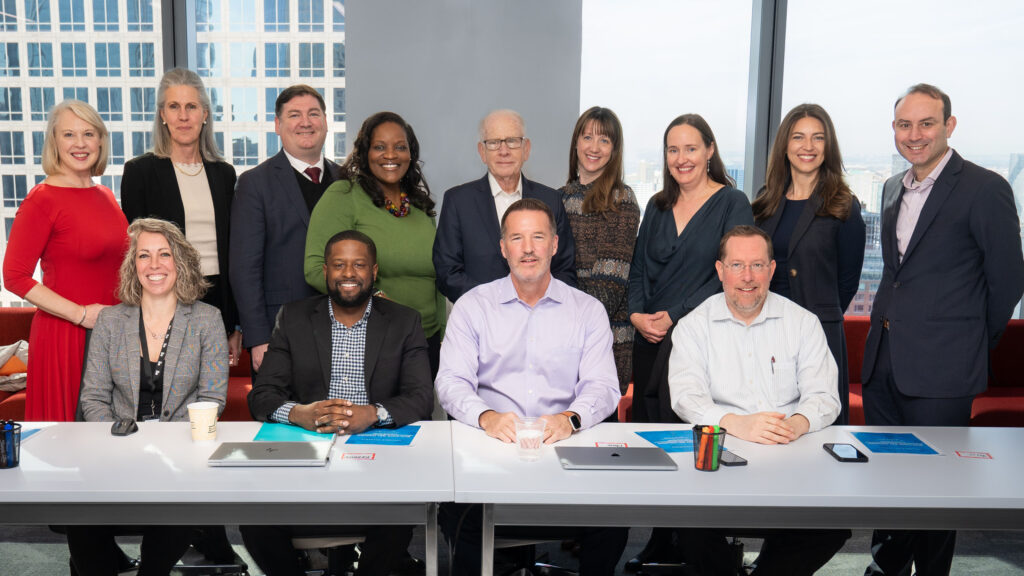 The IIE Executive Leadership Team pose together in our offices in New York.